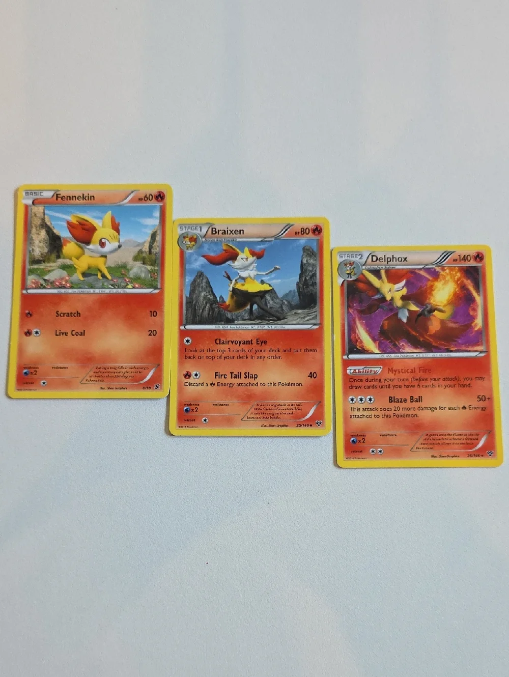 Pokemon Fennekin, Braixen, And Delphox Card